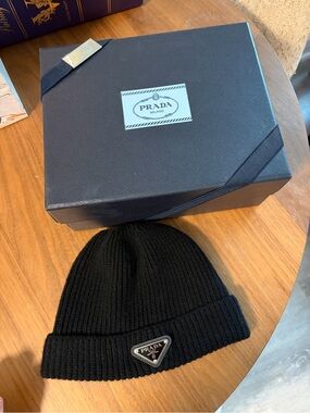 In box 100% authentic Prada Black Ribbed Wool Beanie with Logo